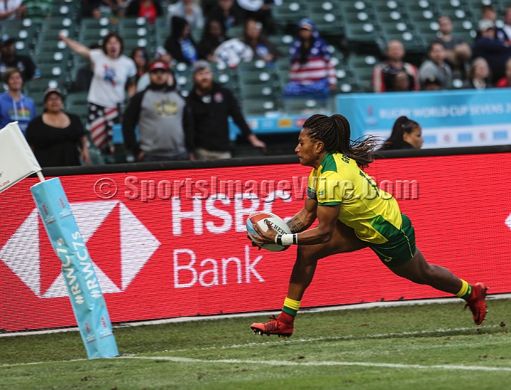 2018RugbySevensSat-40.JPG - Australian player Ellia Green takes a kick in for a try against the United States the women's championship Bronze medal match of the 2018 Rugby World Cup Sevens, Saturday, July 21, 2018, at AT&T Park, San Francisco. (Spencer Allen/IOS via AP)